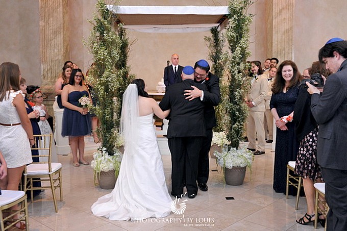 bride and groom at the chuppah