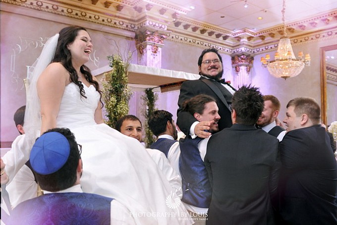 bride and groom hora dance